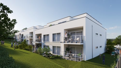Moderne weiße Wohnanlage mit Balkonen und grünen Rasenflächen auf einem Hügel.
